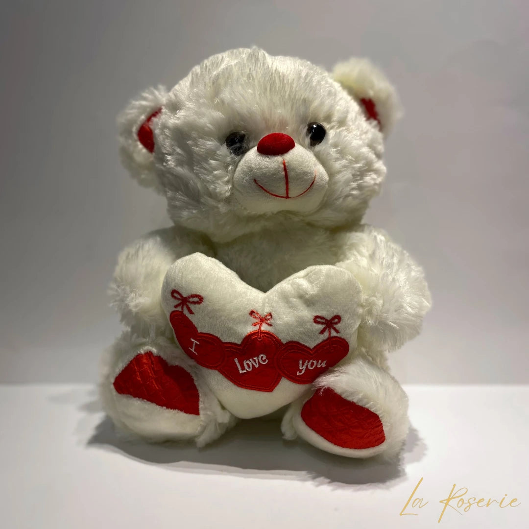 ajándék plüss maci szívvel