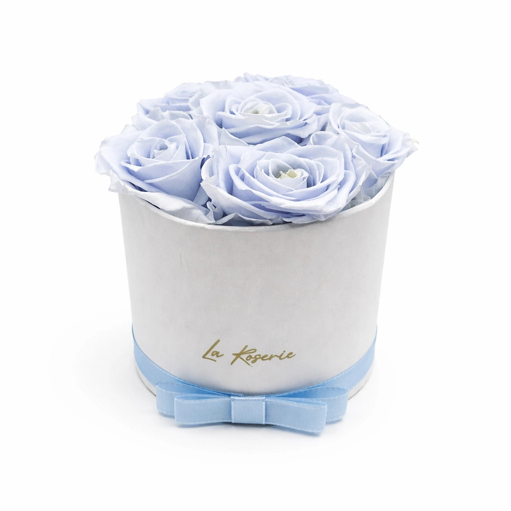 világoskék örökrózsa dobozban